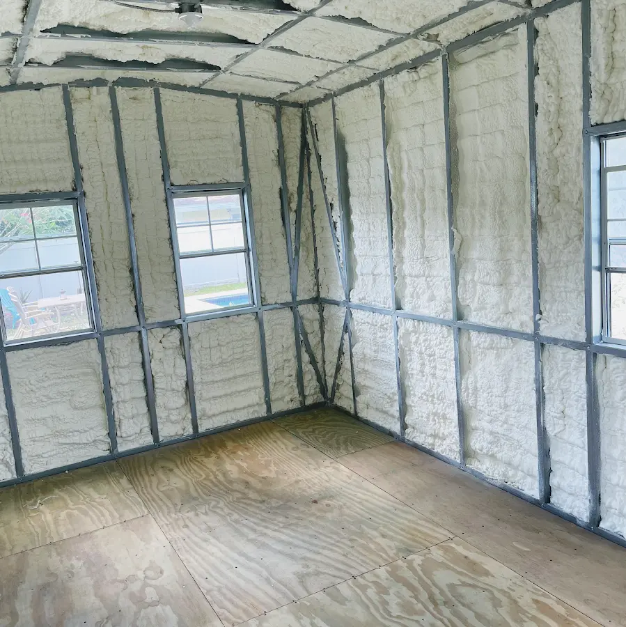 Closed-cell spray foam insulation applied to wall cavities in a residential project in Bagley